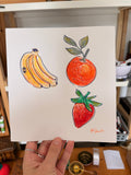 Dessin de bananes, d'une orange et d'une fraise